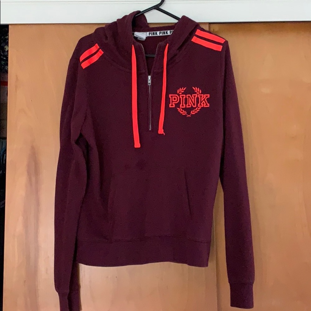Maroon with neon orange detail vs pink hoodie